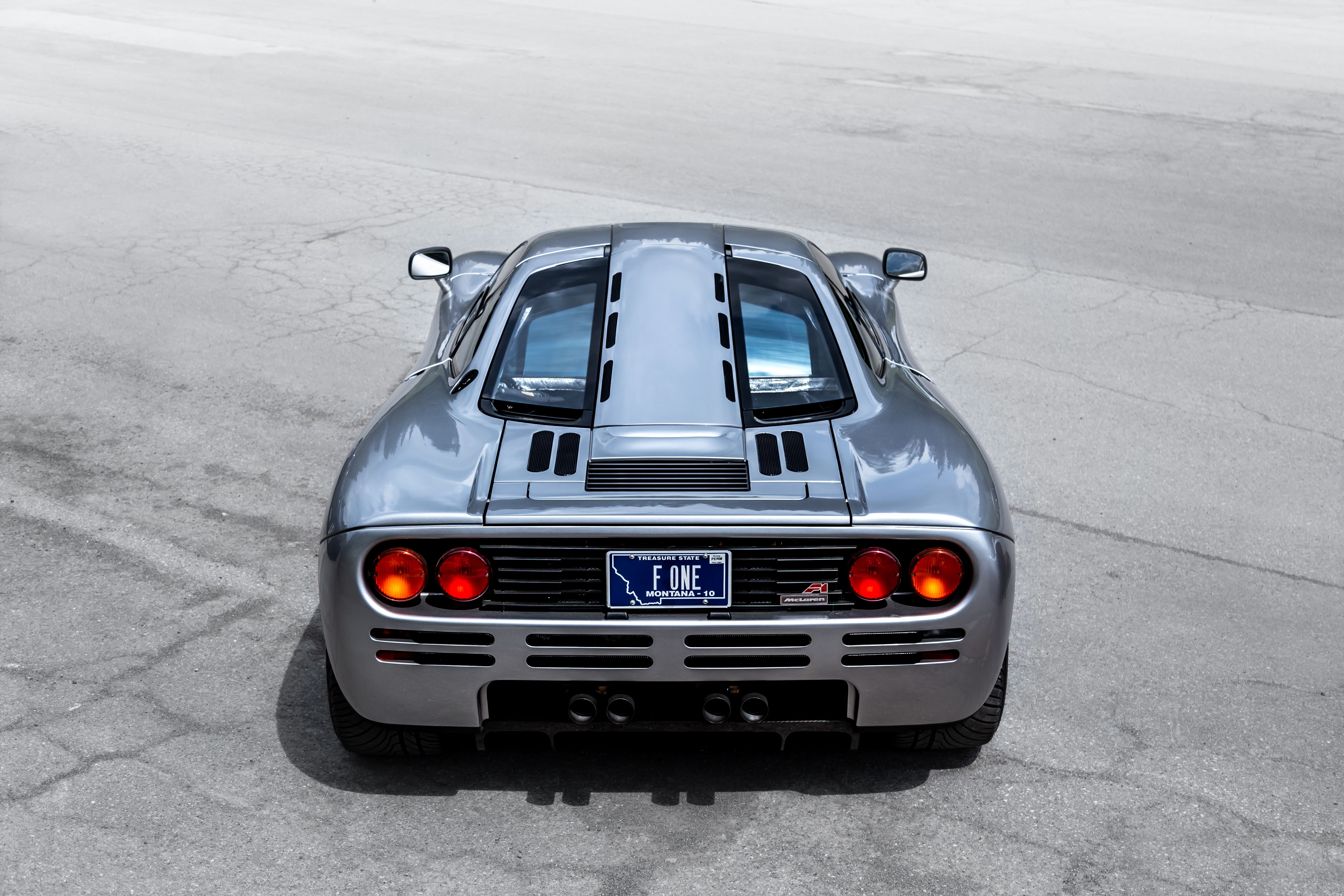McLaren F1 rear view against the sky